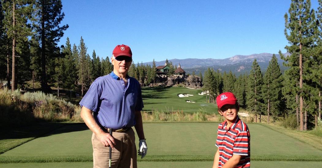 Larry-and-grandson-golfing-at-Martis-Camp.jpg
