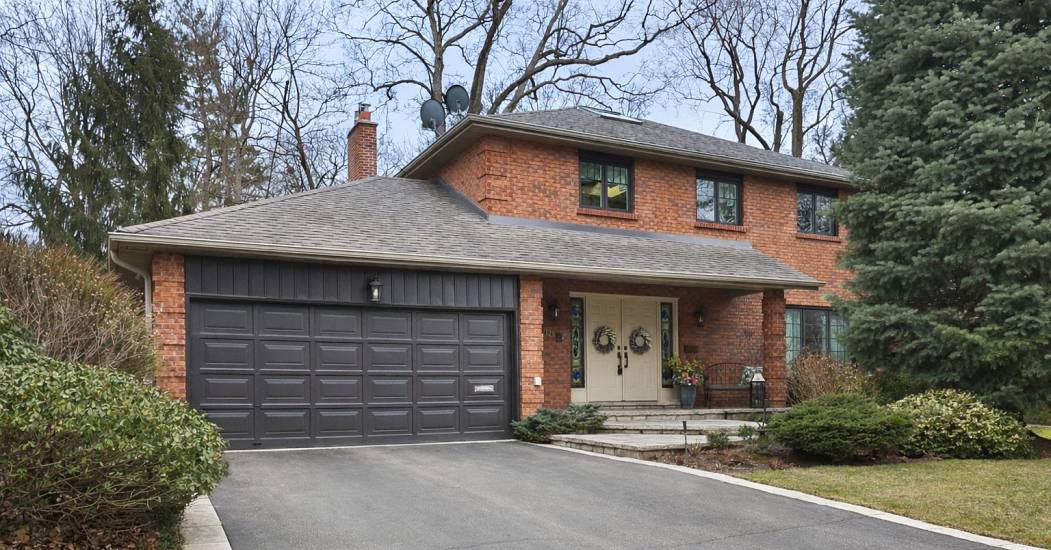 Charming suburban home with lush greenery.jpg