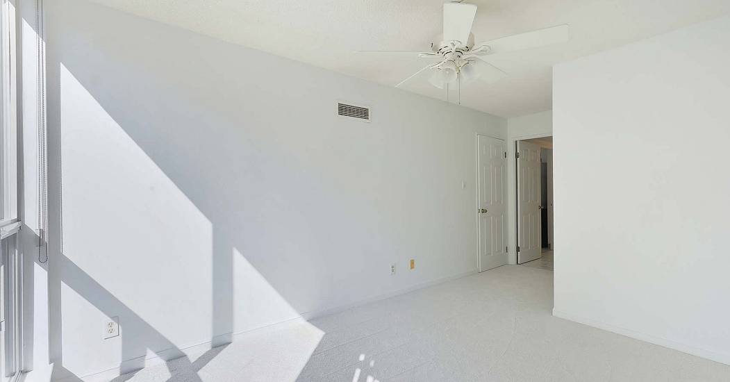 020-Your-Primary-Bedroom-Shown-As-Move-In-Ready-With-New-Carpet.jpg