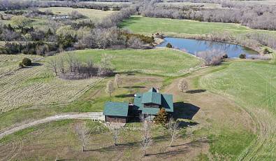 Rustic Log Home on 18.81 Acres M/L