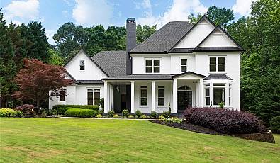 Welcome to this exquisitely renovated 7-bedroom, 6 full bath home in Suwanee, Georgia! 